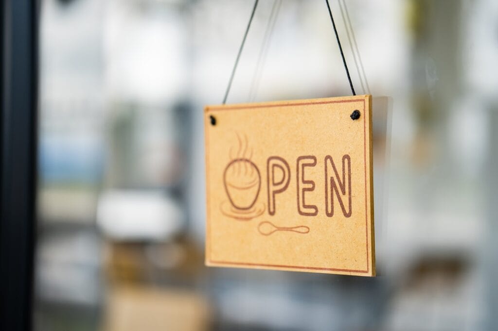 shallow close of open sign written on wooden mate 2025 02 02 15 06 36 utc