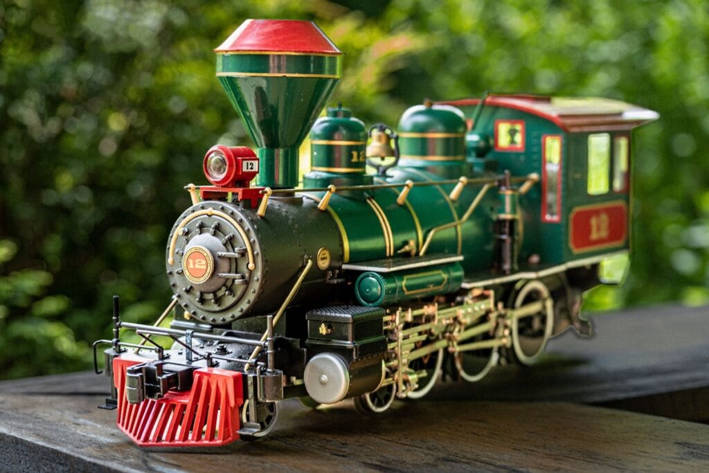 green toy train on a wooden table 2025 02 13 14 41 03 utc