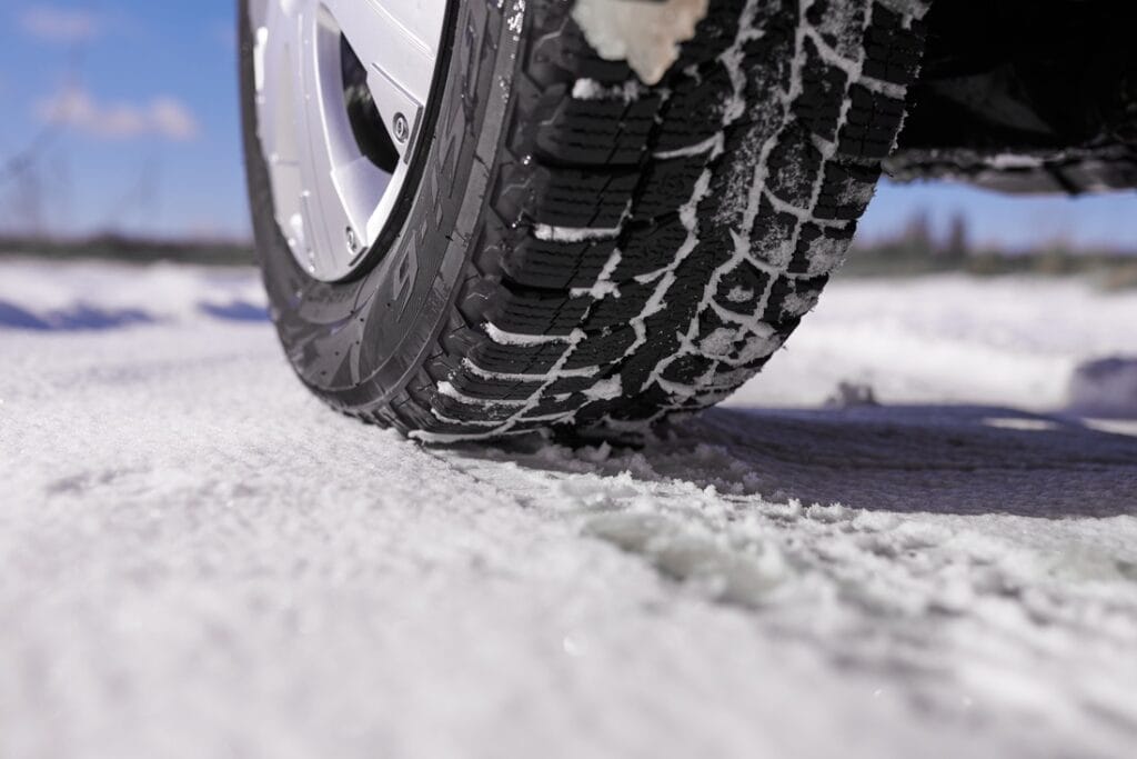 car tires on winter snow road 2025 03 15 11 47 57 utc