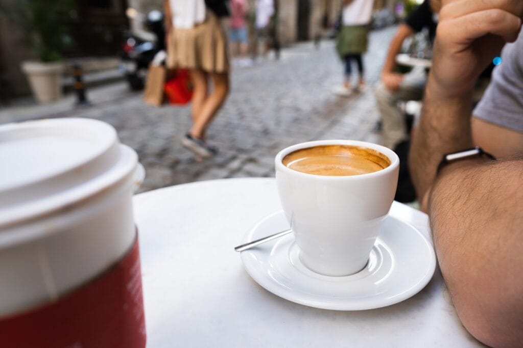 close up photo of hands holding a cup of coffee in 2026 01 08 05 50 31 utc
