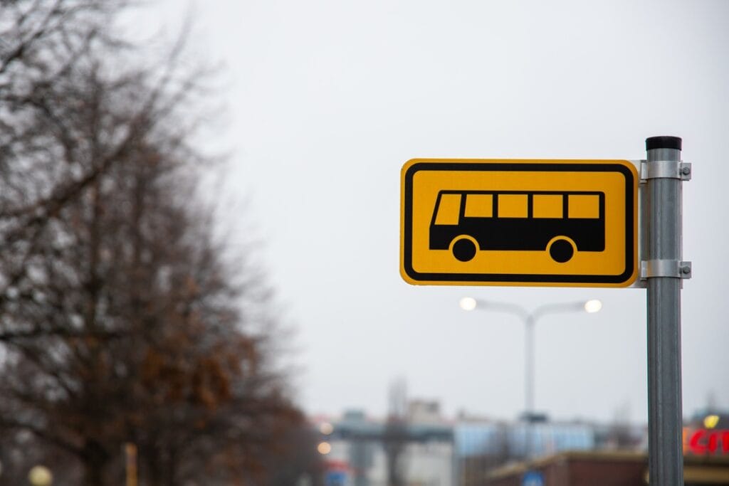 yellow bus sign on the road 2026 01 07 23 14 27 utc
