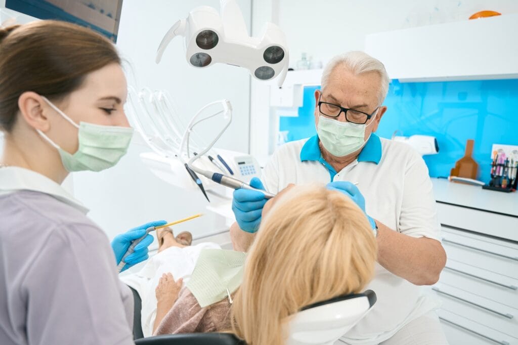 male doctor with sterile instrument doing treatmen 2026 01 05 06 19 49 utc