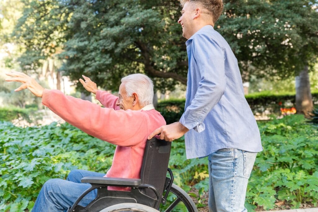 side view of grandson assisting senior man in whee 2026 03 26 23 28 30 utc