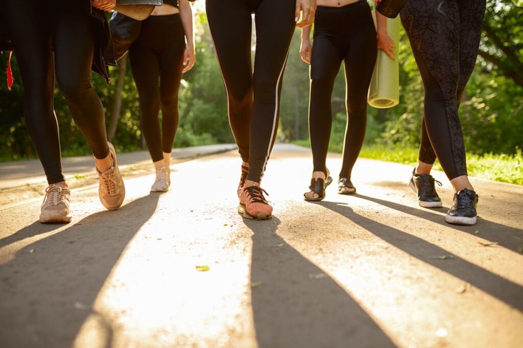 women walking together on path in natural setting 2026 03 17 00 16 07 utc