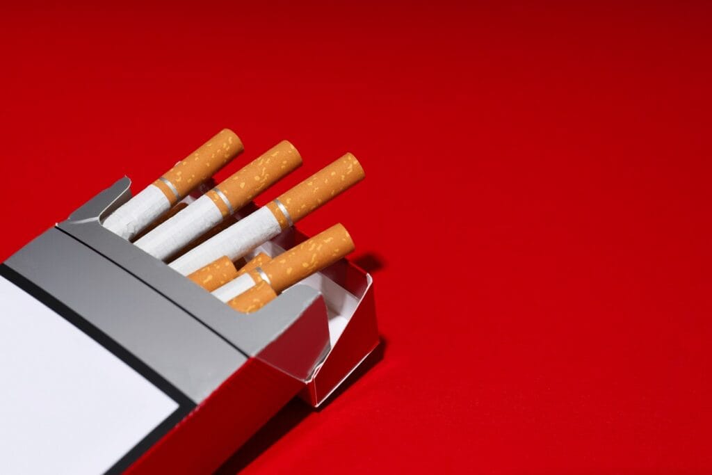 cigarette pack close up on red background 2026 09 24 10 37 06 utc