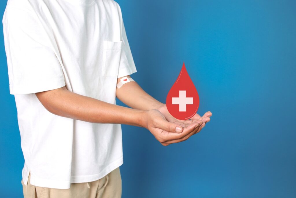 blood donation concept with graphic on blue backgr 2026 09 23 07 02 48 utc