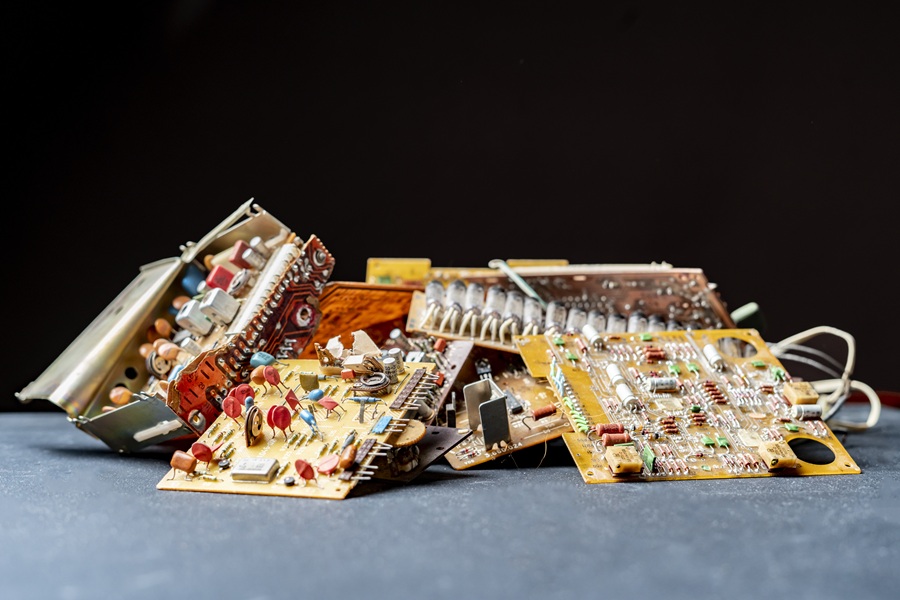 pile of old circuit boards on dark surface 2026 09 21 14 02 38 utc