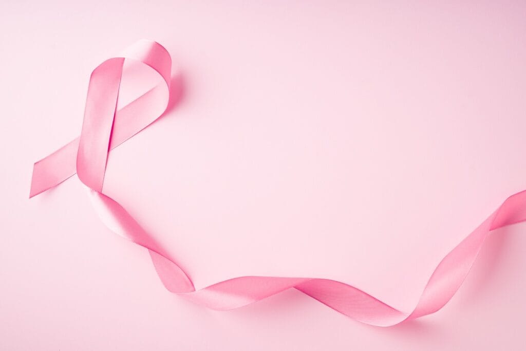 pink ribbon on pink background symbolizing breast 2026 09 23 02 15 55 utc